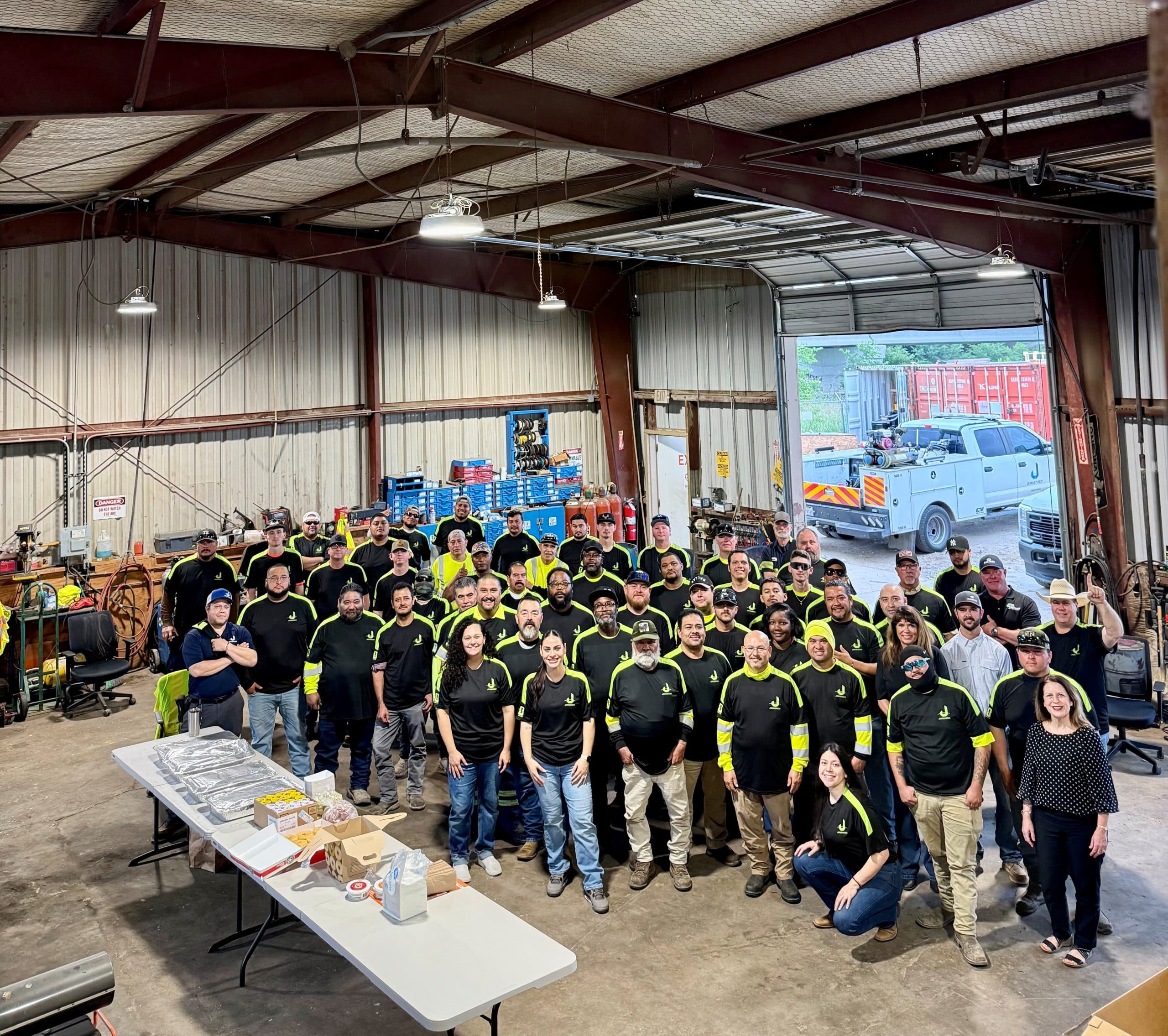 Large group of workers in warehouse